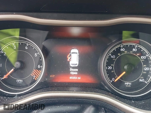 2015 Jeep Cherokee Limited with VIN 1C4PJLDB1FW708157, listed as a IAAI auction lot 41502567 with 85,354 mi miles and . Bid and sale history available at DreamBid. Image 7.