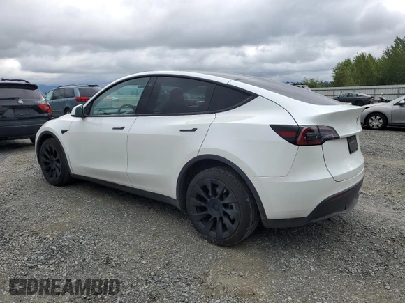 2023 Tesla Model Y Long Range z VIN 7SAYGDEE3PF751019, wystawiony jako Copart lot #57972885 z przebiegiem 24 591 mil mil oraz Szkoda całkowita • Salvage title. Historia ofert i sprzedaży dostępna na DreamBid. Obrazek 2.