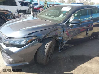 2019 Toyota Avalon Hybrid Limited with VIN 4T1B21FB9KU004539, listed as a IAAI auction lot 41784328 with 99,811 mi miles. Bid and sale history available at carsss.com. Image 6.