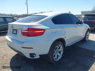 2011 BMW X6 35i with VIN 5UXFG2C58BLX07890, listed as a IAAI auction lot 42067800 with 144,367 mi miles. Bid and sale history available at carsss.com. Image 4.