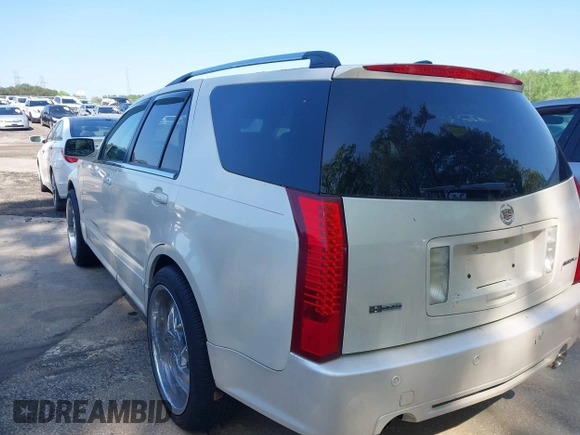 2008 Cadillac SRX with VIN 1GYEE63A480108836, listed as a IAAI auction lot 41993953 with 135,254 mi miles. Bid and sale history available at carsss.com. Image 3.
