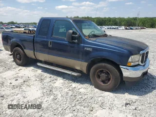 2004 Ford F-250 XL with VIN 1FTNX20L34ED90771, listed as a Copart auction lot 54047935 with 353,728 mi miles and Salvage title. Bid and sale history available at DreamBid. Image 4.