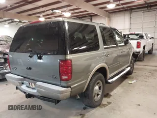 1999 Ford Expedition XLT z VIN 1FMPU18LXXLB47700, wystawiony jako IAAI lot #41592004 z przebiegiem Nie podano mil oraz . Historia ofert i sprzedaży dostępna na DreamBid. Obrazek 4.
