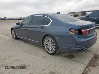 2018 BMW 7 Series 740i z VIN WBA7E2C50JG741970, wystawiony jako Copart lot #56480695 z przebiegiem 53 740 mil mil oraz Szkoda całkowita • Salvage title. Historia ofert i sprzedaży dostępna na DreamBid. Obrazek 2.