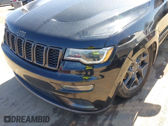 2019 Jeep Grand Cherokee Limited with VIN 1C4RJFBG2KC666974, listed as a IAAI auction lot 41780057 with 76,770 mi miles and . Bid and sale history available at DreamBid. Image 17.