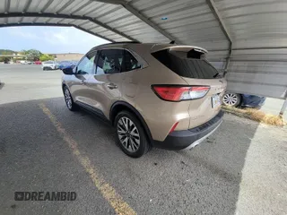 2020 Ford Escape Titanium Hybrid with VIN 1FMCU0DZ5LUB81972, listed as a IAAI auction lot 42679188 with 19,400 mi miles and . Bid and sale history available at DreamBid. Image 13.