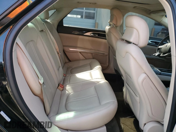 2016 Lincoln MKZ z VIN 3LN6L2J95GR629768, wystawiony jako Copart lot #49098085 z przebiegiem 116 365 mil mil oraz Szkoda całkowita • Salvage title. Historia ofert i sprzedaży dostępna na DreamBid. Obrazek 10.