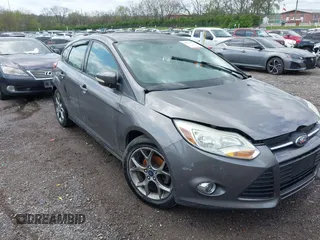 2014 Ford Focus SE with VIN 1FADP3K28EL337377, listed as a IAAI auction lot 41962856 with 137,906 mi miles. Bid and sale history available at carsss.com. Image 12.