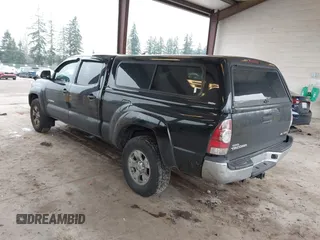 2015 Toyota Tacoma with VIN 3TMMU4FN1FM086408, listed as a IAAI auction lot 41320197 with 161,356 mi miles and . Bid and sale history available at DreamBid. Image 3.