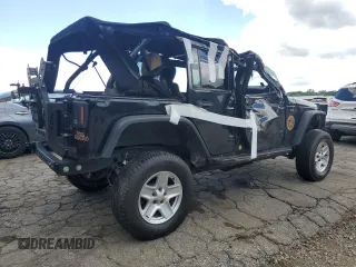 2012 Jeep Wrangler Unlimited Sport z VIN 1C4BJWDG7CL208265, wystawiony jako Copart lot #56101095 z przebiegiem 141 527 mil mil oraz Szkoda całkowita • Salvage title. Historia ofert i sprzedaży dostępna na DreamBid. Obrazek 3.