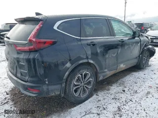 2020 Honda CR-V Hybrid EX-L with VIN 7FART6H86LE006441, listed as a IAAI auction lot 41032430 with 67,426 mi miles. Bid and sale history available at carsss.com. Image 4.
