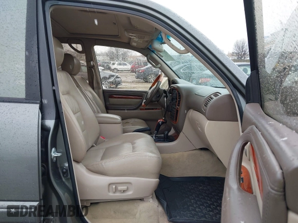 2000 Lexus LX 470 z VIN JT6HT00W8Y0092556, wystawiony jako IAAI lot #41727615 z przebiegiem 156 262 mil mil oraz . Historia ofert i sprzedaży dostępna na DreamBid. Obrazek 5.