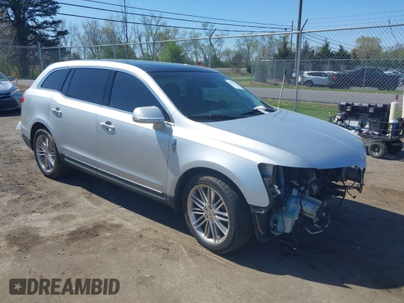 2015 Lincoln MKT EcoBoost with VIN 2LMHJ5AT4FBL00959, listed as a IAAI auction lot 41991763 with 159,687 mi miles and . Bid and sale history available at DreamBid. Image 1.