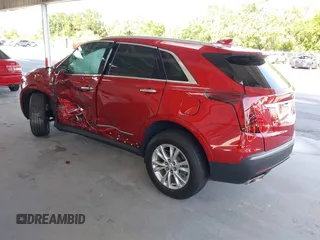 2024 Cadillac XT5 FWD Luxury with VIN 1GYKNAR42RZ738679, listed as a IAAI auction lot 42355530 with 14,660 mi miles and . Bid and sale history available at DreamBid. Image 3.