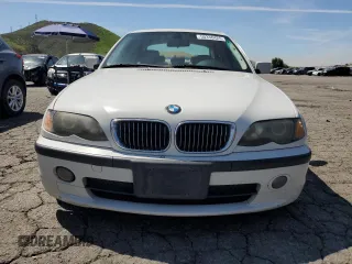 2005 BMW 3 Series 330i with VIN WBAEV53455KM41084, listed as a Copart auction lot 50338425 with 223,116 mi miles and Salvage title. Bid and sale history available at DreamBid. Image 5.