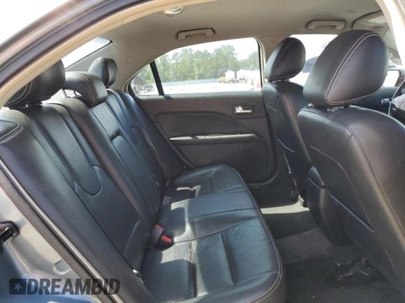 2012 Ford Fusion SEL z VIN 3FAHP0JA1CR182047, wystawiony jako Copart lot #56521525 z przebiegiem 200 523 mil mil oraz Szkoda całkowita • Salvage title. Historia ofert i sprzedaży dostępna na DreamBid. Obrazek 10.