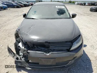 2013 Volkswagen Jetta SE с VIN 3VWDX7AJ4DM401838, выставлен на аукционе Copart как лот 86765074 с пробегом 105 218 миль миль и Списание • Salvage title. История ставок и продаж доступна на DreamBid. Изображение 5.