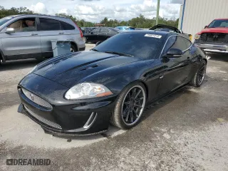 2011 Jaguar XK with VIN SAJWA4DCXBMB39622, listed as a Copart auction lot 79881914 with 61,163 mi miles and Salvage Title. Bid and sale history available at carsss.com. Image 1.