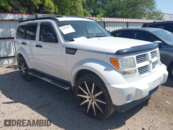 2011 Dodge Nitro Heat with VIN 1D4PT4GX9BW587284, listed as a IAAI auction lot 41998357 with 100,366 mi miles and . Bid and sale history available at DreamBid. Image 1.