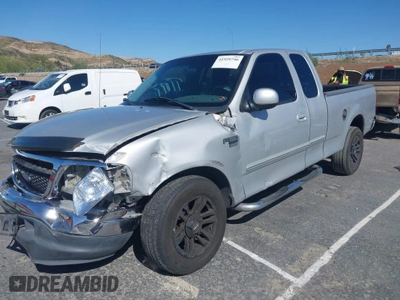 1999 Ford F-150 XL with VIN 1FTRX17L3XKB76368, listed as a IAAI auction lot 41959746 with Not Provided miles. Bid and sale history available at carsss.com. Image 2.