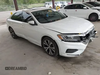 2021 Volkswagen Passat SE with VIN 1VWSA7A33MC009641, listed as a IAAI auction lot 42620013 with 84,590 mi miles and . Bid and sale history available at DreamBid. Image 1.