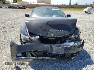 2009 BMW 6 Series 650i with VIN WBAEB53569C224337, listed as a Copart auction lot 68148974 with 75,057 mi miles and Salvage Title. Bid and sale history available at carsss.com. Image 5.