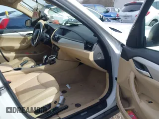 2015 BMW X1 xDrive28i with VIN WBAVL1C59FVY40443, listed as a IAAI auction lot 41777176 with 91,560 mi miles. Bid and sale history available at carsss.com. Image 5.
