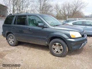 2004 Honda Pilot EX with VIN 2HKYF18494H557884, listed as a IAAI auction lot 42075748 with 205,723 mi miles. Bid and sale history available at carsss.com. Image 1.