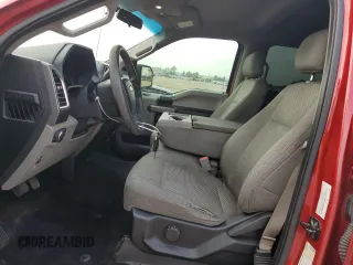 2016 Ford F-150 XLT with VIN 1FTEW1C86GKD79757, listed as a Copart auction lot 54757115 with 161,535 mi miles and Salvage title. Bid and sale history available at DreamBid. Image 7.