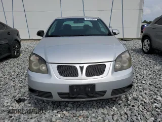 2007 Pontiac G5 z VIN 1G2AL15FX77395082, wystawiony jako Copart lot #56042275 z przebiegiem 150 552 mil mil oraz Szkody całkowita. Historia ofert i sprzedaży dostępna na DreamBid. Obrazek 5.