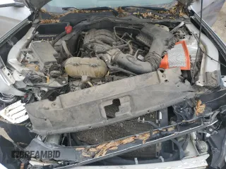 2015 Ford Mustang V6 z VIN 1FATP8EM5F5415089, wystawiony jako Copart lot #55514595 z przebiegiem 118 572 mil mil oraz Szkoda całkowita • Salvage title. Historia ofert i sprzedaży dostępna na DreamBid. Obrazek 11.
