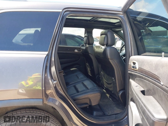 2014 Jeep Grand Cherokee Limited with VIN 1C4RJFBT0EC241030, listed as a IAAI auction lot 42617051 with 104,370 mi miles and . Bid and sale history available at DreamBid. Image 8.
