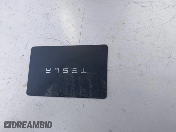 2022 Tesla Model Y Long Range with VIN 7SAYGAEEXNF381389, listed as a IAAI auction lot 41613075 with 52,800 mi miles and . Bid and sale history available at carsss.com. Image 11.