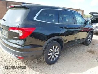 2021 Honda Pilot EX-L with VIN 5FNYF6H57MB064595, listed as a IAAI auction lot 41942327 with 46,150 mi miles and . Bid and sale history available at DreamBid. Image 4.