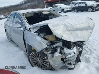 2014 Lincoln MKZ z VIN 3LN6L2J92ER832064, wystawiony jako IAAI lot #41374046 z przebiegiem 84 000 mil mil oraz . Historia ofert i sprzedaży dostępna na DreamBid. Obrazek 11.