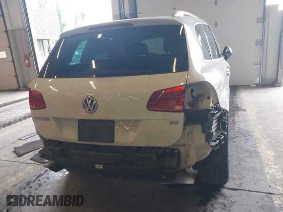 2013 Volkswagen Touareg Lux with VIN WVGEF9BP6DD007323, listed as a IAAI auction lot 41488959 with 123,383 mi miles and . Bid and sale history available at DreamBid. Image 17.