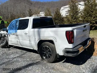 2021 GMC Sierra 1500 SLE with VIN 3GTU9BED9MG475288, listed as a IAAI auction lot 41705153 with 28,984 mi miles. Bid and sale history available at carsss.com. Image 3.