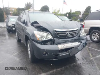 2007 Lexus RX 400h with VIN JTJGW31U872003871, listed as a IAAI auction lot 41579851 with 98,758 mi miles and . Bid and sale history available at DreamBid. Image 1.