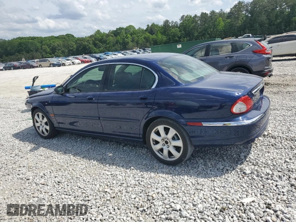 2004 Jaguar X-Type with VIN SAJEA51C44WD83361, listed as a Copart auction lot 55643545 with 54,615 mi miles and Salvage Title. Bid and sale history available at DreamBid. Image 2.
