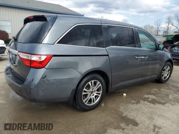 2013 Honda Odyssey EX z VIN 5FNRL5H40DB033400, wystawiony jako Copart lot #50552155 z przebiegiem 223 770 mil mil oraz Nie do naprawy. Historia ofert i sprzedaży dostępna na DreamBid. Obrazek 3.
