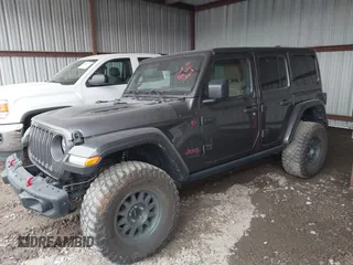 2021 Jeep Wrangler Unlimited Rubicon with VIN 1C4JJXFM6MW538774, listed as a IAAI auction lot 42368651 with 49,490 mi miles and . Bid and sale history available at DreamBid. Image 14.