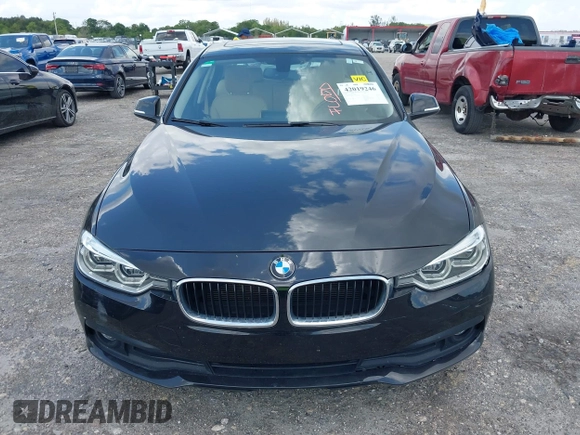 2018 BMW 3 Series 320i with VIN WBA8E1G57JNU88781, listed as a IAAI auction lot 42019246 with 56,820 mi miles. Bid and sale history available at carsss.com. Image 13.