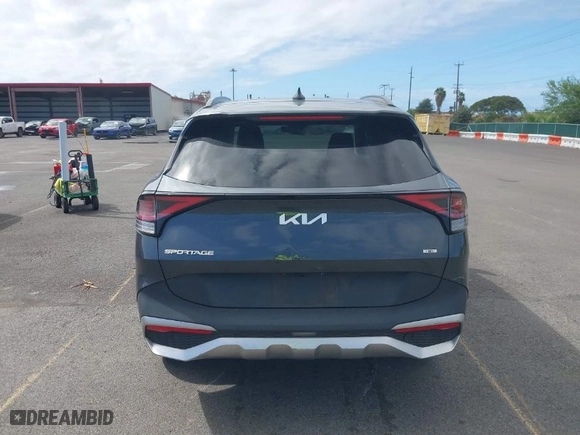 2023 Kia Sportage Hybrid EX with VIN KNDPVCAG5P7020209, listed as a IAAI auction lot 41409698 with 67,953 mi miles. Bid and sale history available at carsss.com. Image 17.