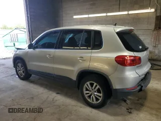 2013 Volkswagen Tiguan S with VIN WVGAV3AX9DW626065, listed as a Copart auction lot 58014145 with 128,858 mi miles and Salvage title. Bid and sale history available at DreamBid. Image 2.