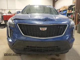 2023 Cadillac XT4 AWD Sport z VIN 1GYFZFR47PF153453, wystawiony jako Copart lot #56988695 z przebiegiem 67 533 mil mil oraz Szkody całkowita. Historia ofert i sprzedaży dostępna na DreamBid. Obrazek 5.