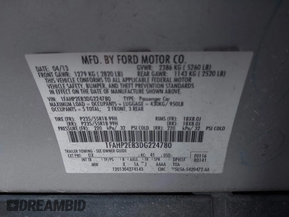 2013 Ford Taurus SEL with VIN 1FAHP2E83DG224780, listed as a IAAI auction lot 41675601 with 166,977 mi miles. Bid and sale history available at carsss.com. Image 9.
