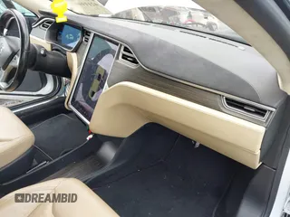 2016 Tesla Model S 90D with VIN 5YJSA1E40GF123543, listed as a IAAI auction lot 42111603 with 126,445 mi miles and . Bid and sale history available at DreamBid. Image 5.