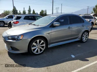 2015 Mitsubishi Lancer GT with VIN JA32U8FW6FU019871, listed as a Copart auction lot 68389694 with 106,523 mi miles and Salvage Title. Bid and sale history available at carsss.com. Image 1.