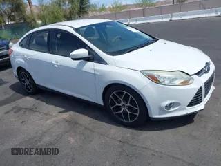 2012 Ford Focus SE with VIN 1FAHP3F24CL462319, listed as a IAAI auction lot 41981509 with 124,831 mi miles. Bid and sale history available at carsss.com. Image 1.