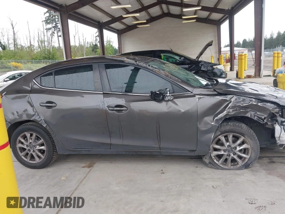 2015 Mazda 3 i Grand Touring with VIN JM1BM1W74F1264770, listed as a IAAI auction lot 42290722 with 161,617 mi miles and . Bid and sale history available at DreamBid. Image 13.